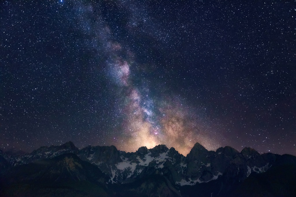 milkyway above slovenian mountains
